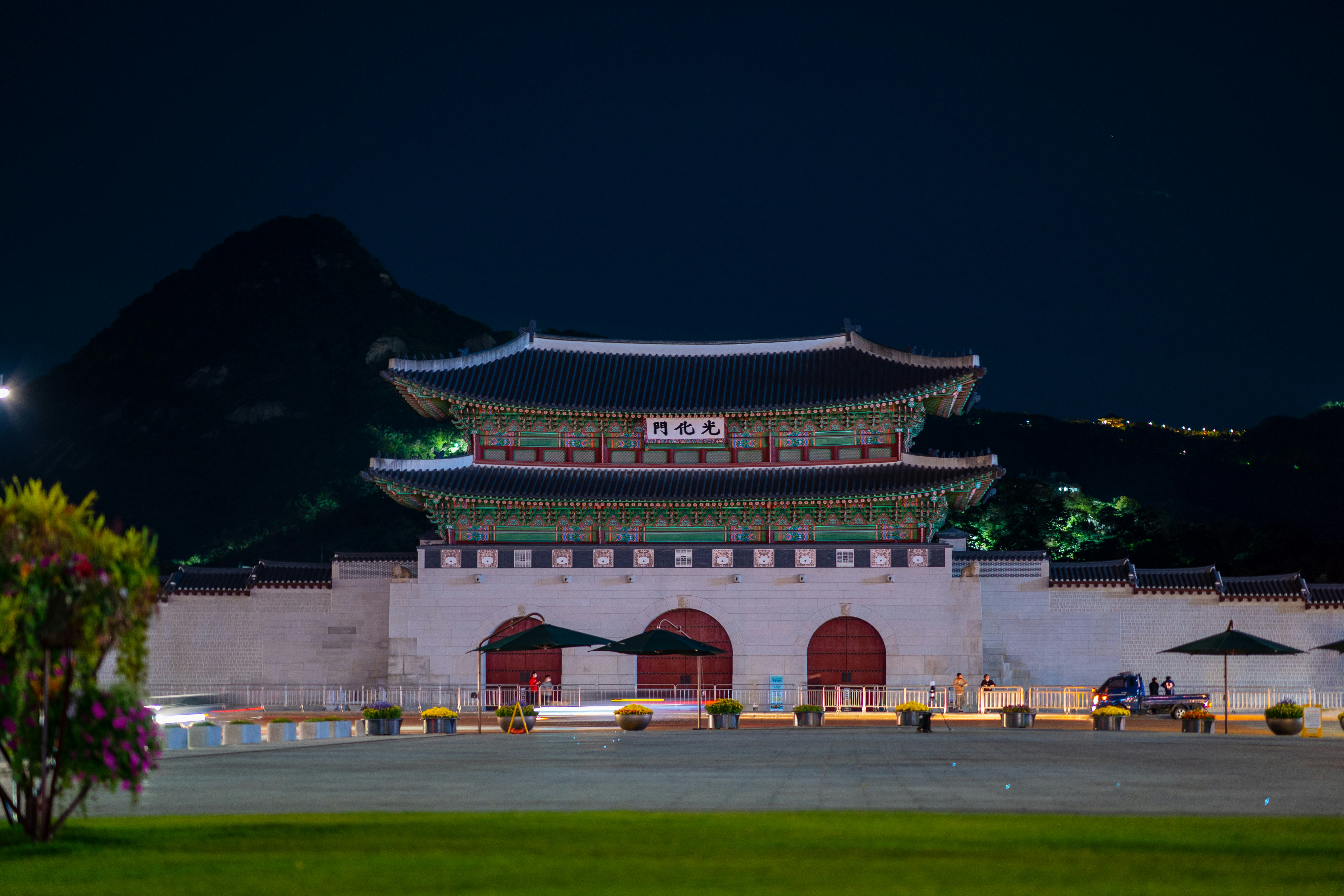 white and red concrete building during nighttime